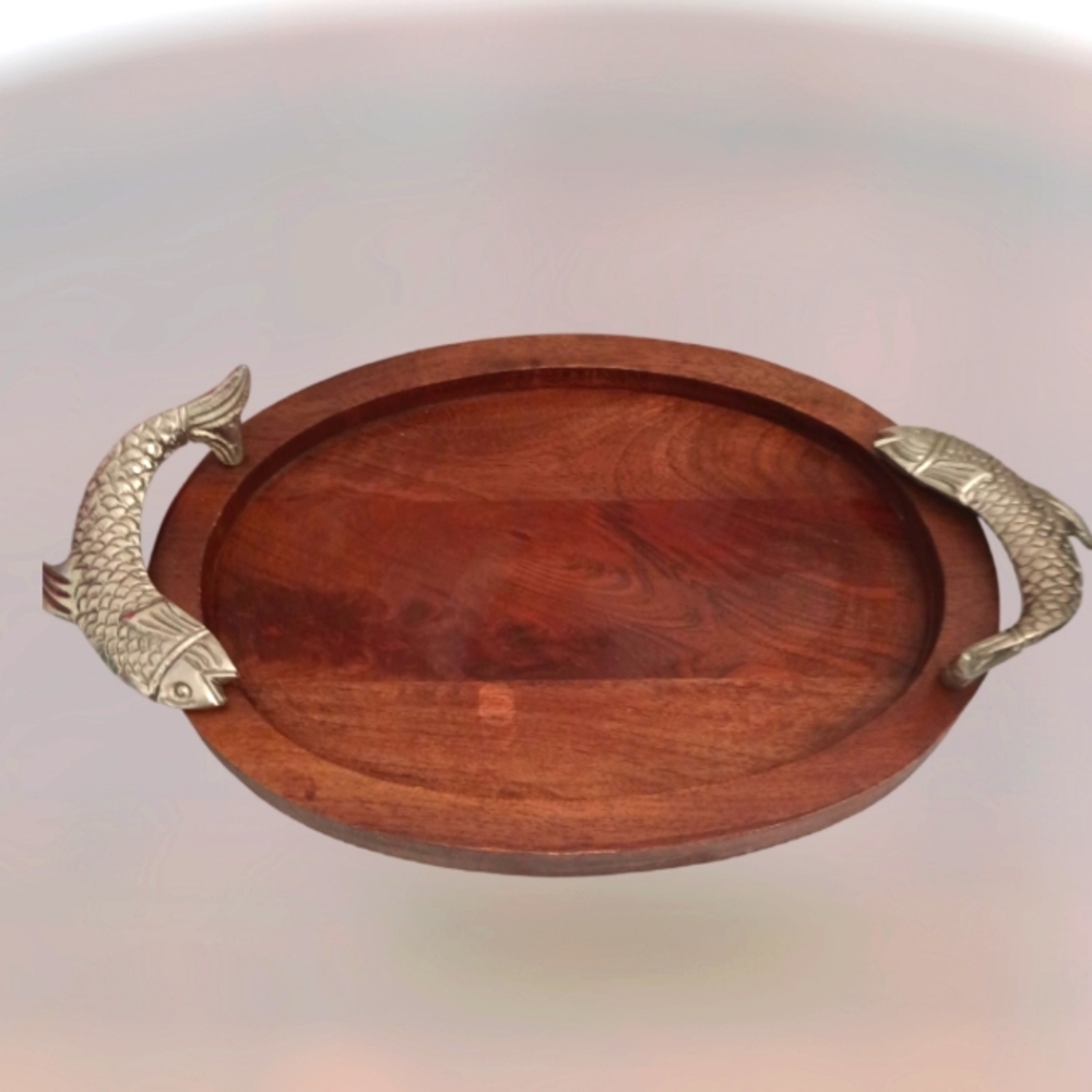 Beautiful wooden serving platter with pewter fish handles.